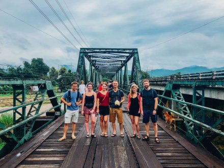 A group photo on the bridge over river Kwai in Kanchanaburi 